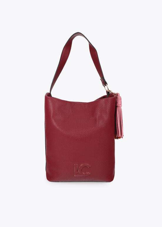 SHOPPER EFECTO PIEL CON POMPONES A CONTRASTE